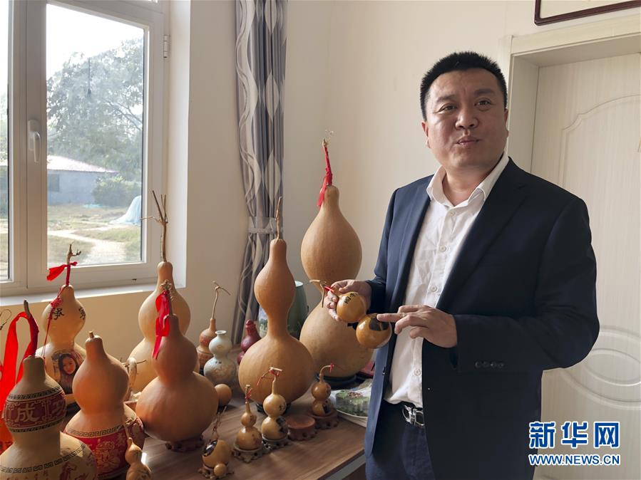 (圖文互動(dòng))(2)“葫蘆村”的“生意經(jīng)”