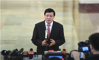 全國社?；鹄硎聲硎麻L樓繼偉接受采訪