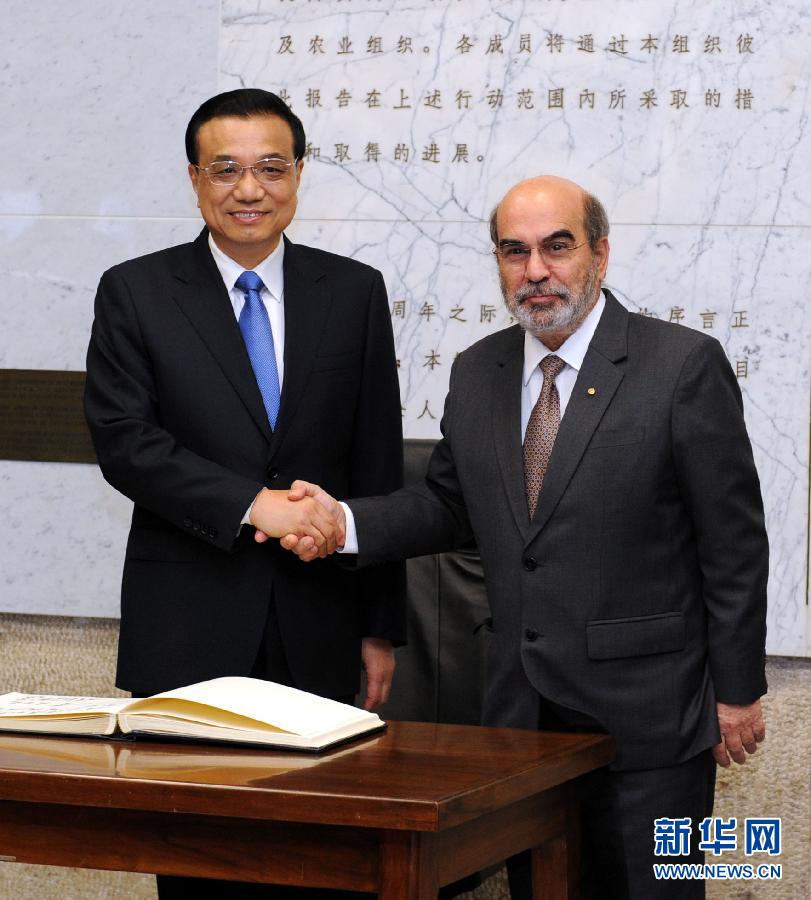10月15日，中國國務院總理李克強在羅馬會見聯(lián)合國糧農(nóng)組織總干事格拉齊亞諾。 新華社記者 饒愛民 攝