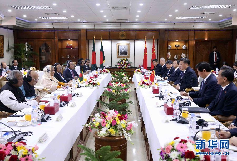 10月14日，國家主席習(xí)近平在達(dá)卡同孟加拉國總理哈西娜舉行會談。 新華社記者劉衛(wèi)兵攝 